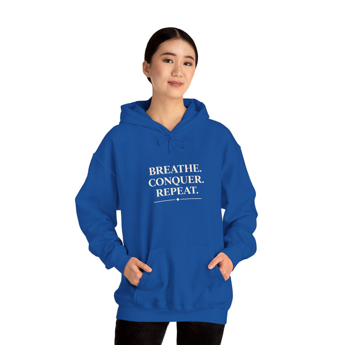 Breathe . conquer, repeat. Hooded Sweatshirt