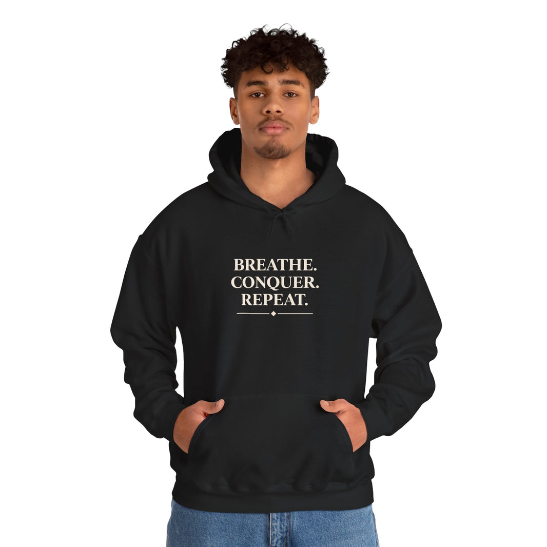 Breathe . conquer, repeat. Hooded Sweatshirt
