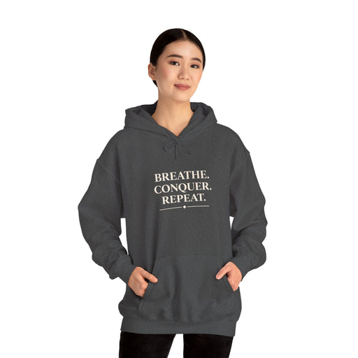 Breathe . conquer, repeat. Hooded Sweatshirt