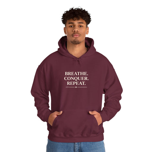 Breathe . conquer, repeat. Hooded Sweatshirt